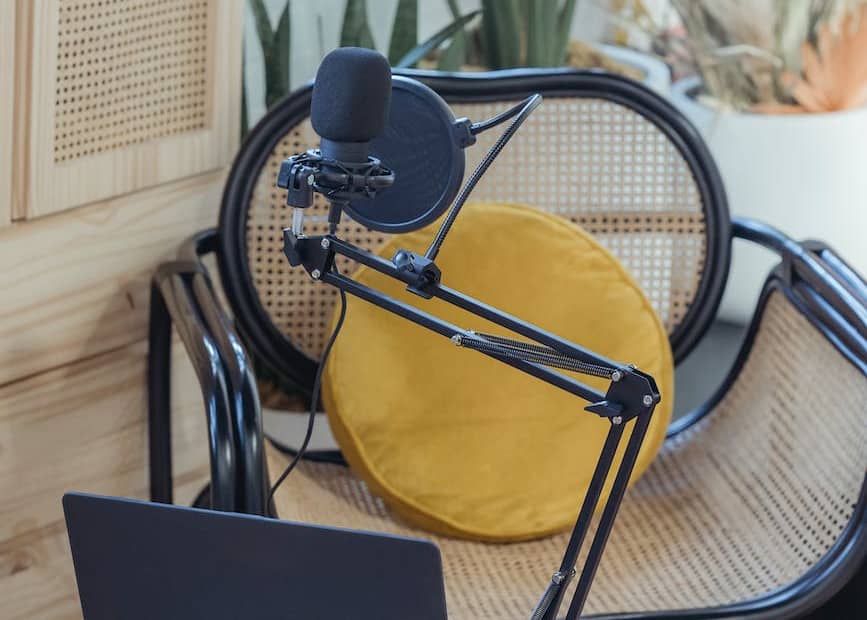 laptop and mic on tripod in studio before recording vlog